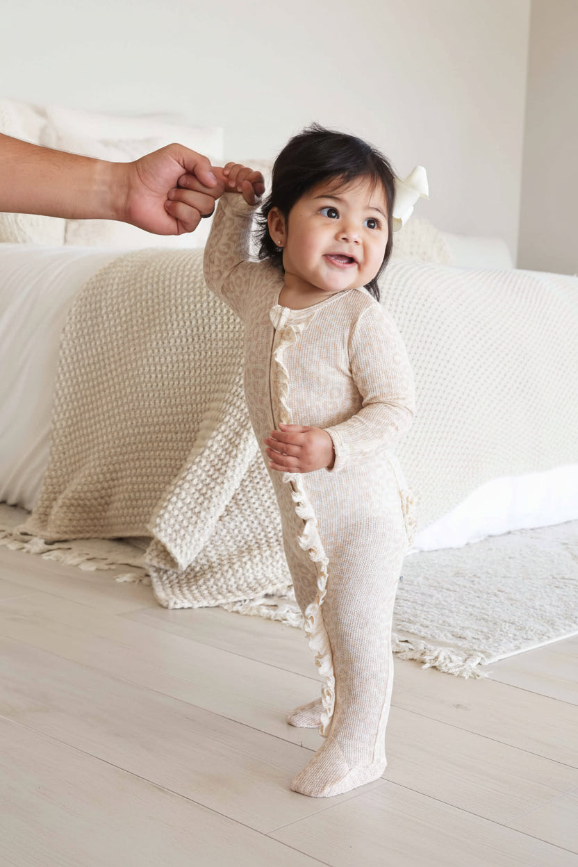 tan leopard print long sleeve footie pajama for baby girls 
