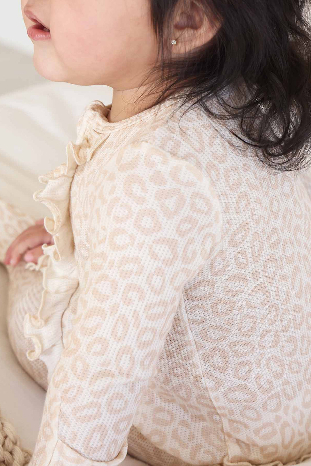 leopard spots ruffle bottom footie baby pj