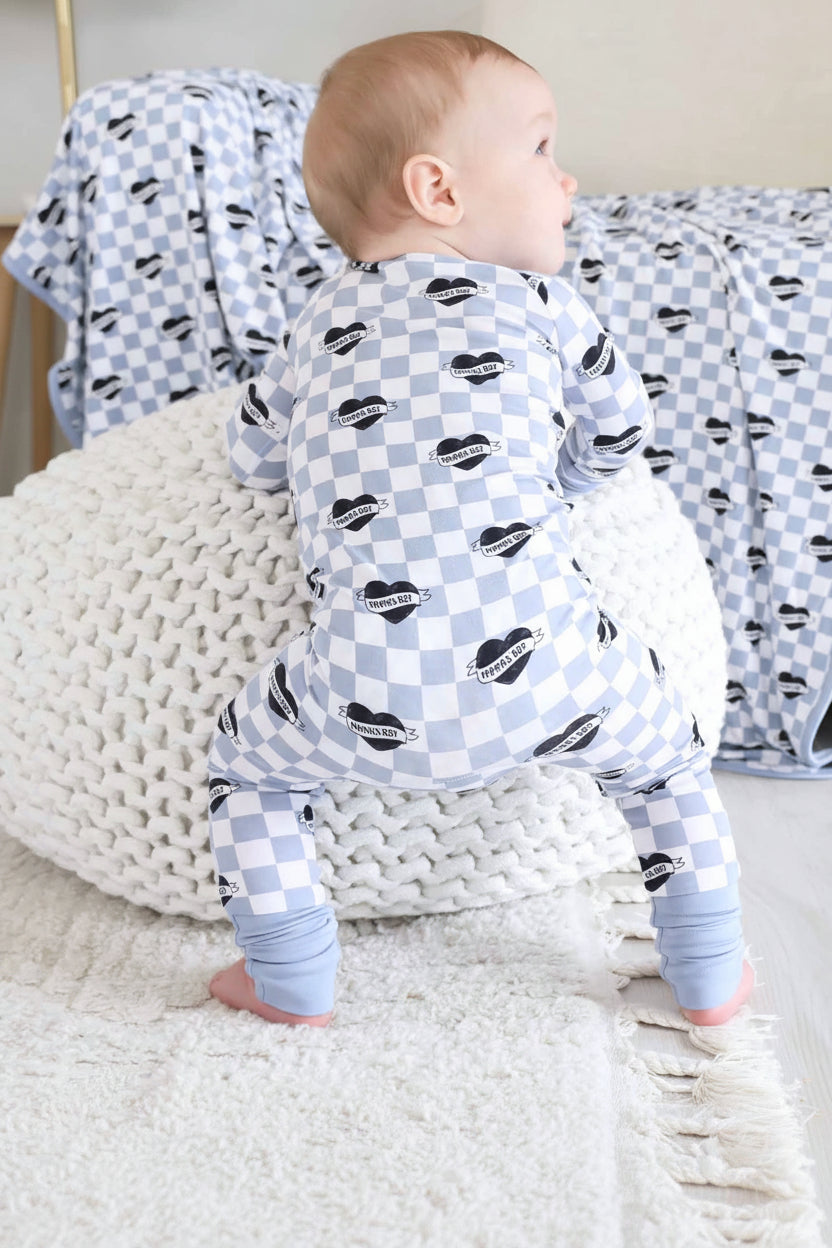 dusty blue and white checkered zip romper for boys with black hearts that say mama's boy