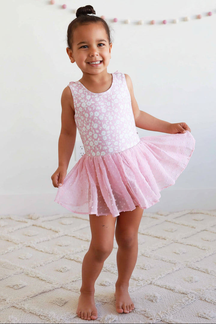 pink tutu leotard with white flowers and dots on skirts 
