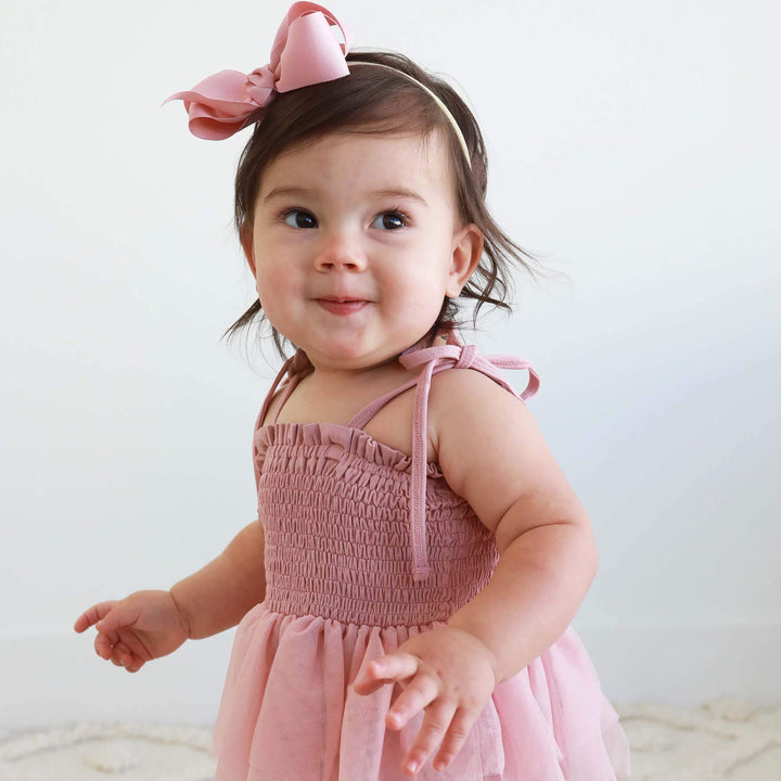 pink spaghetti strap bodysuit for babies 