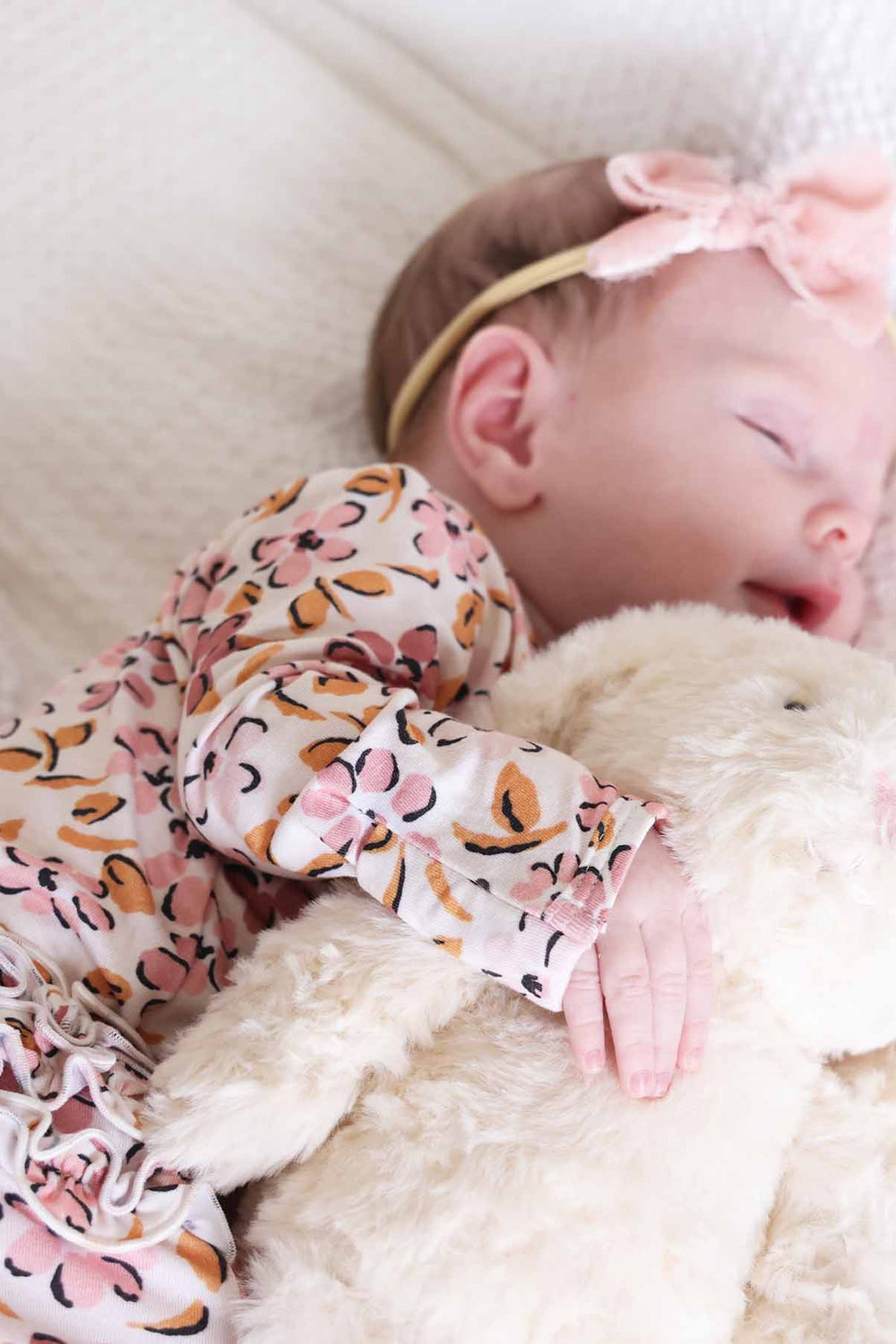 mauvelous meadow baby footie for girls with ruffles