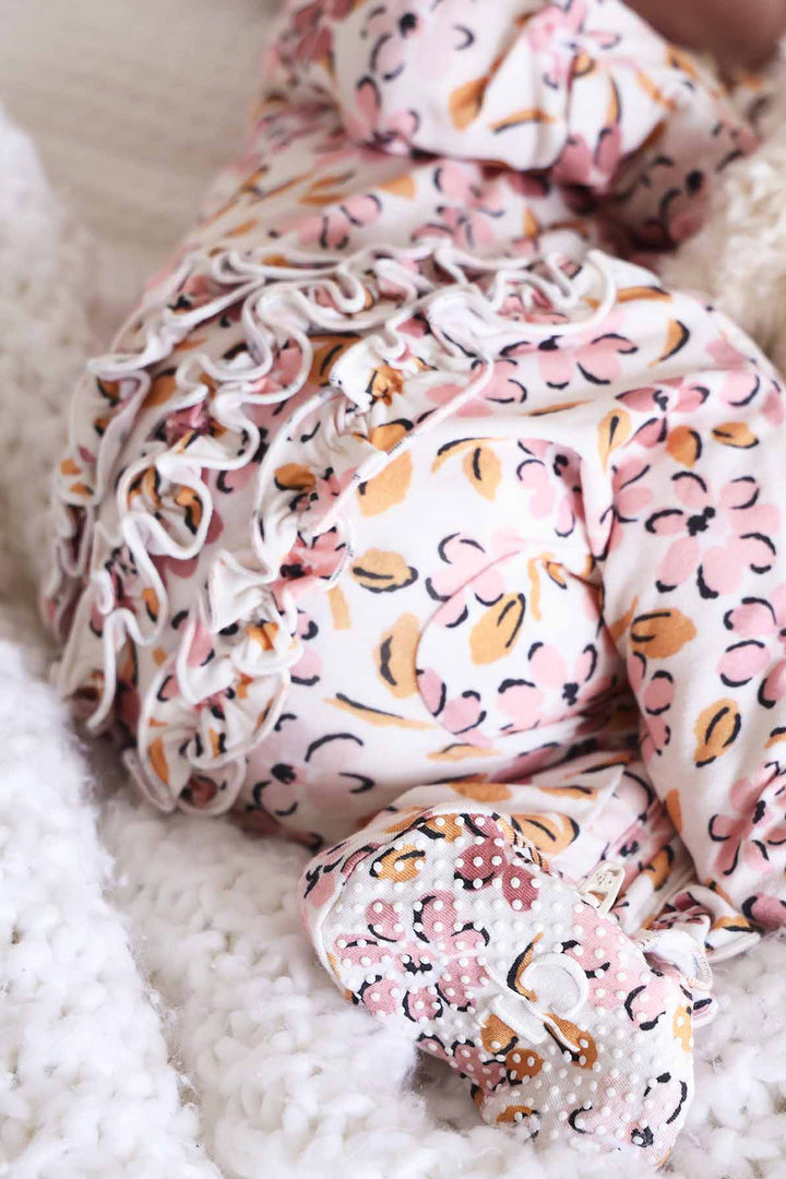 baby zipper footie with ruffles pink and purple floral