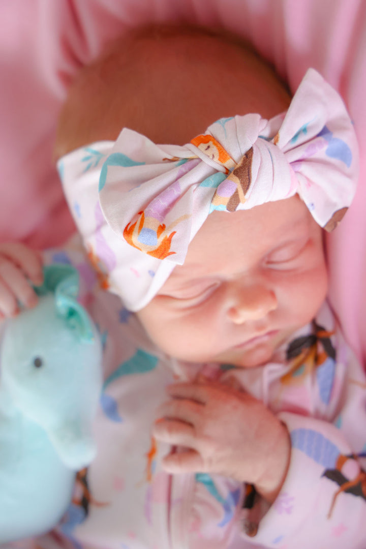 let's be mermaids knit headwrap flat lay, large bow detail
