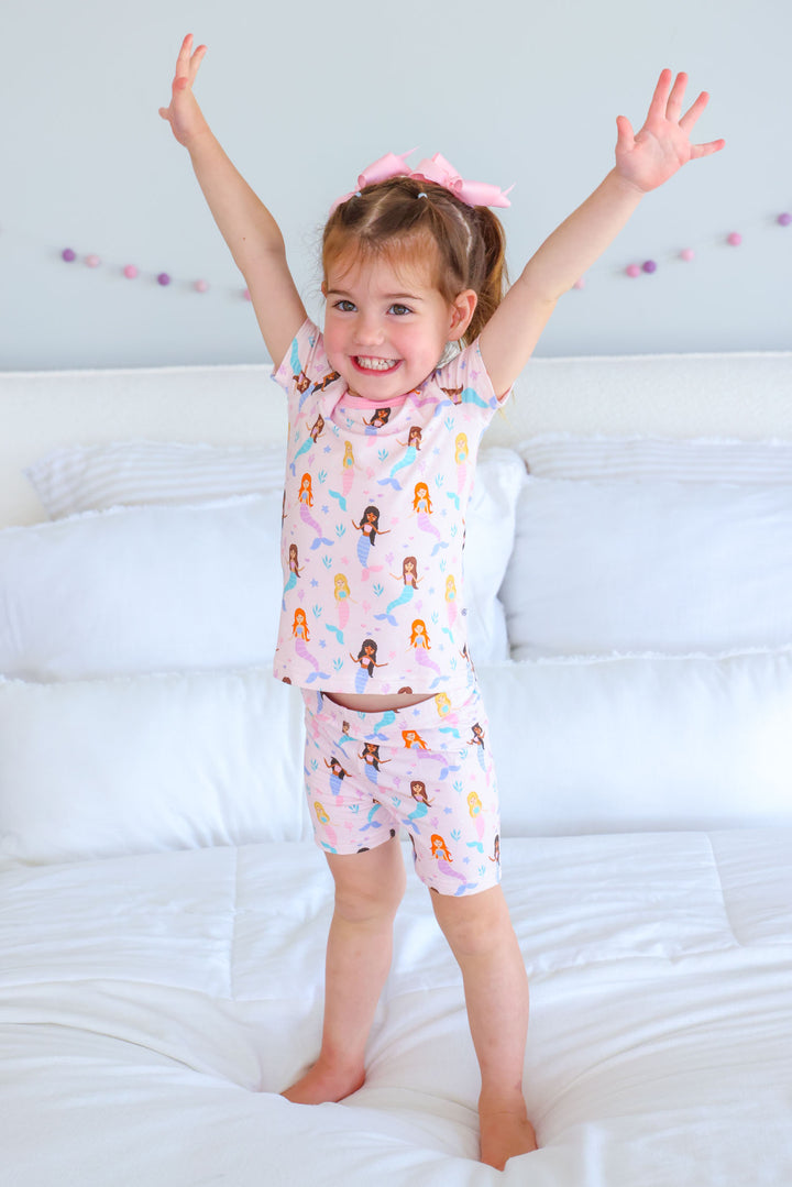baby wearing let's be mermaids bamboo short pajama set, lifestyle photo