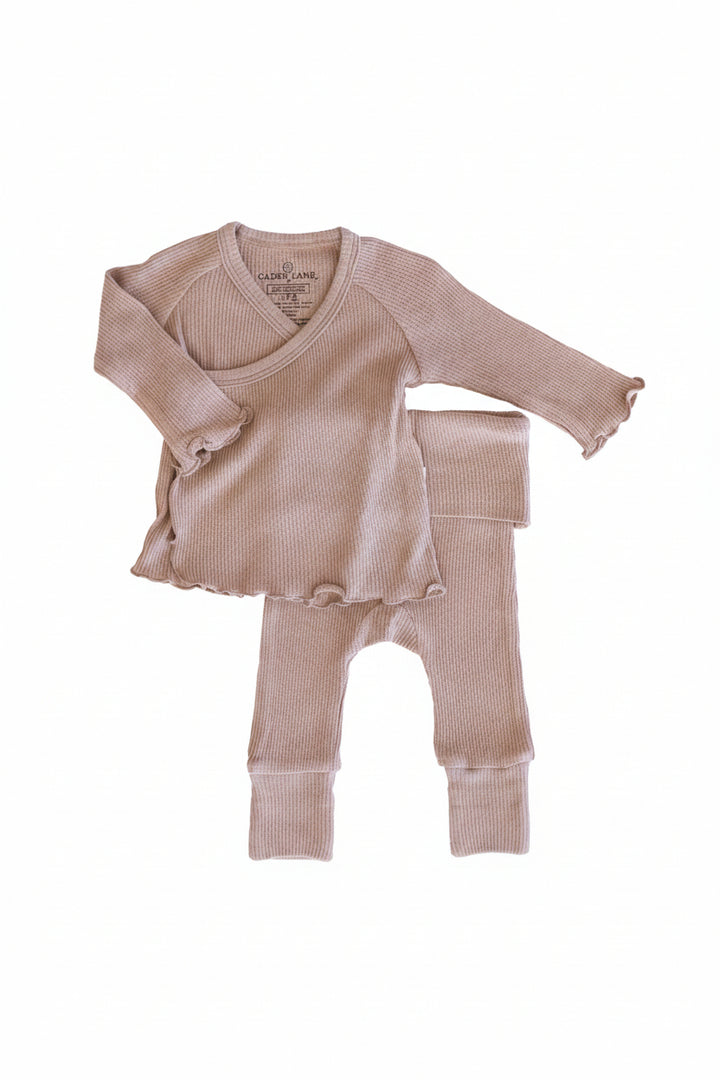 flat lay of the mocha crossover set
