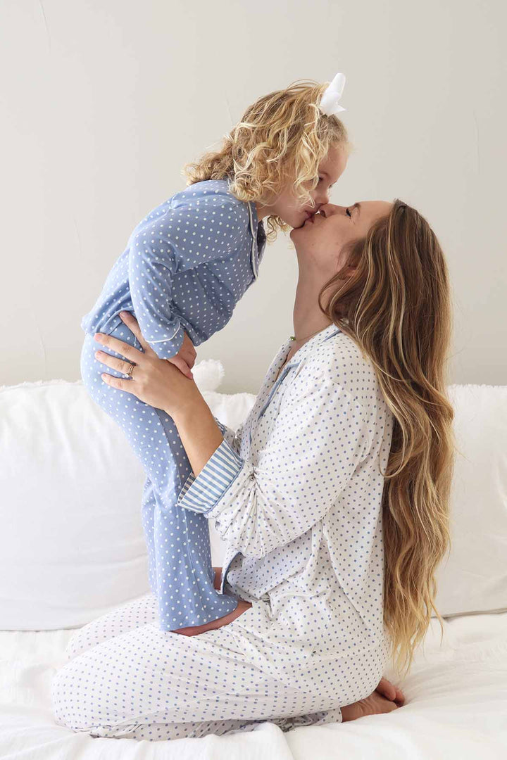 mom and daughter matching polka dot lounge sets with flare pants and long sleeve in inverted colors 