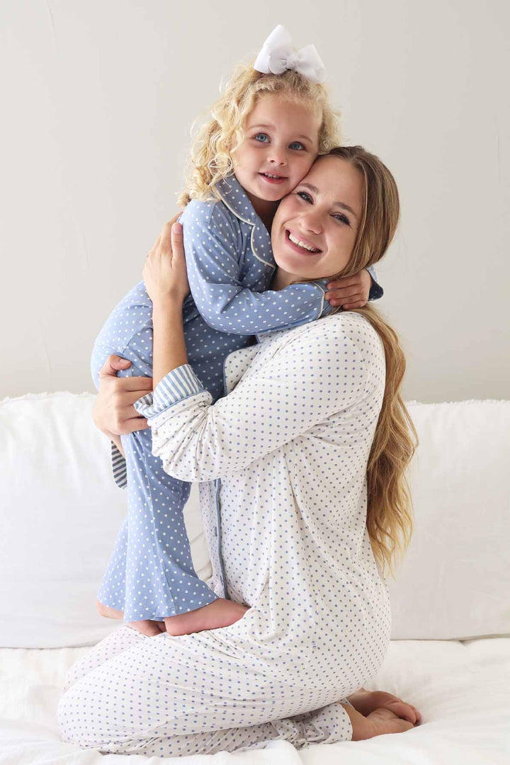 mom and daughter in matching polka dots lounge sets with long sleeve and flare pants made of bamboo viscose 