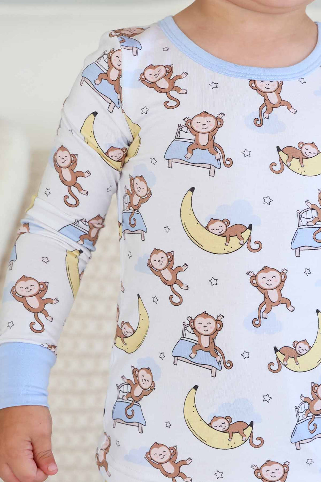 gender neutral sleeping money on banana two piece pajama set for kids made of bamboo viscose 