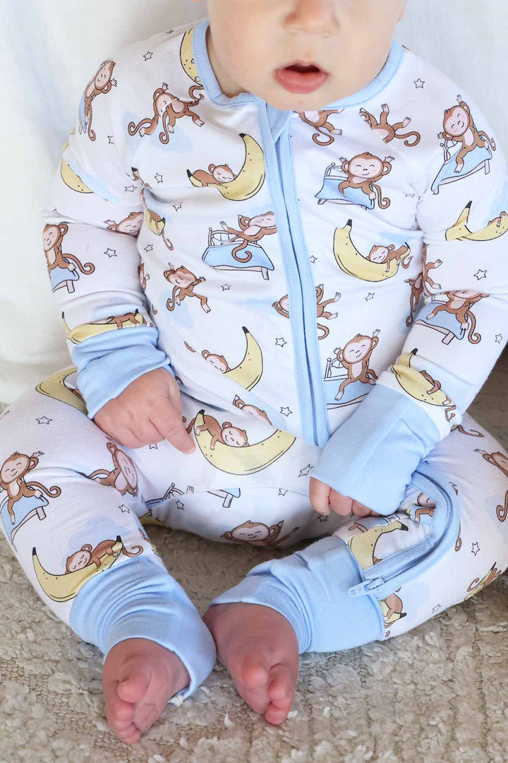 monkey see zip romper pajama blue, yellow, white and brown 