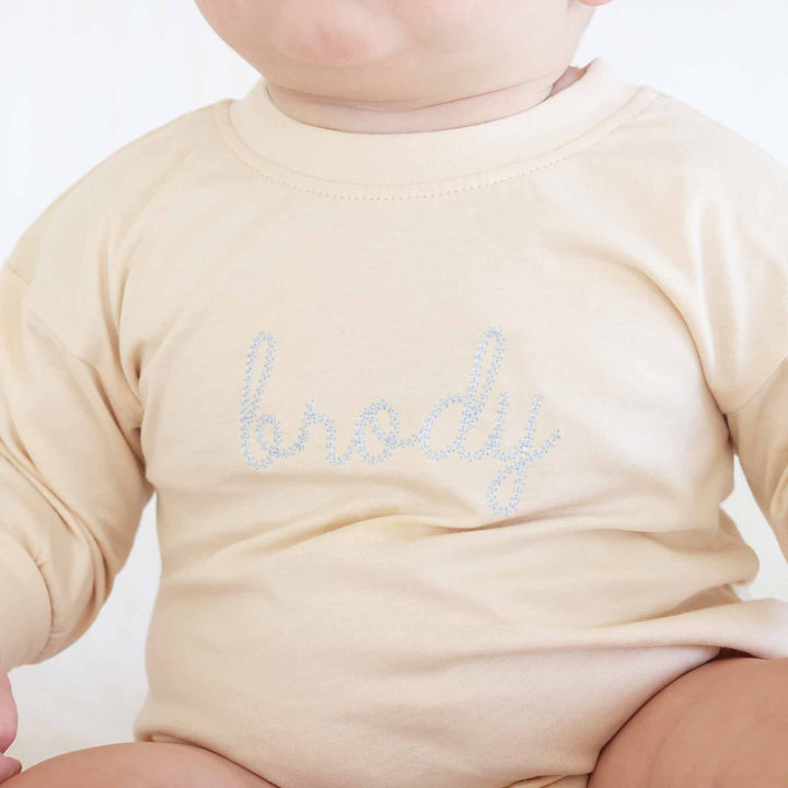 natural embroidered bubble romper for babies light blue thread 