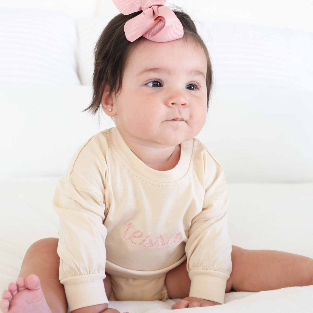 long sleeve natural embroidered romper light pink thread