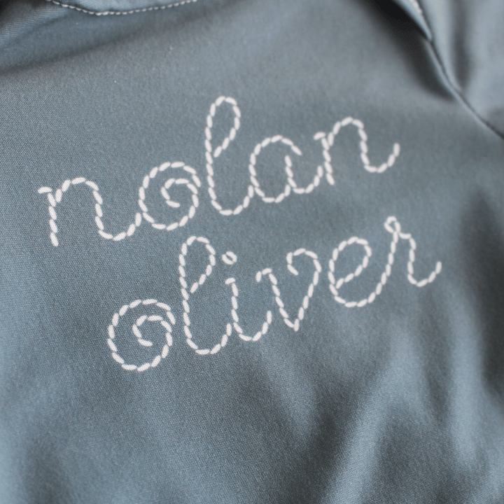 personalized stitched newborn knot gown with name
