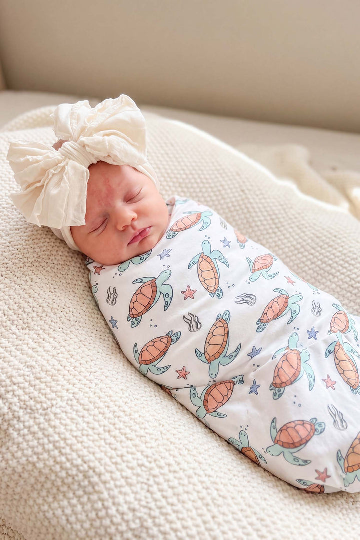 turtle print detail on bamboo – soft and breathable baby sleepwear fabric