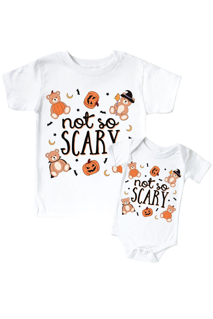 Caden Lane two Halloween-themed baby onesies with teddy bears and pumpkins on a white background.
