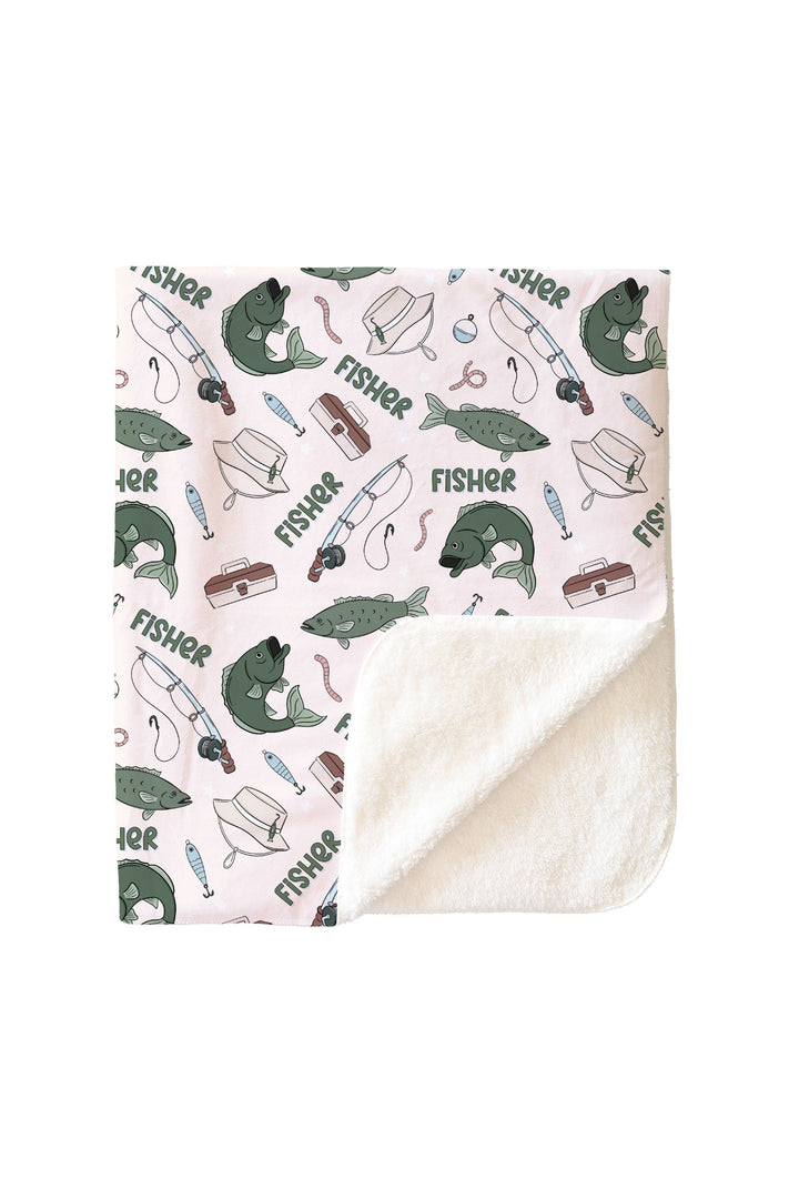 Personalized Off The Hook kids blanket with corner folded showing sherpa lining and fishing themed print on outside