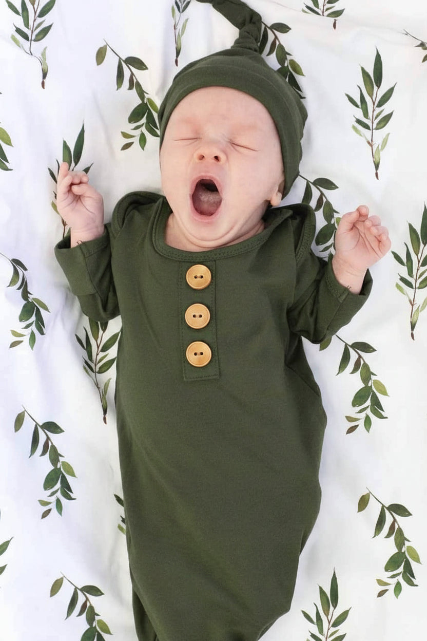 green knot gown for baby with matching hat 