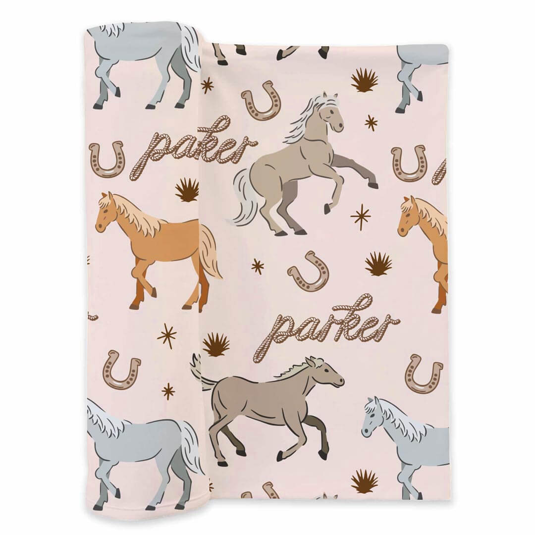 baby personalized swaddle blanket with ponies and horses print - caden lane
