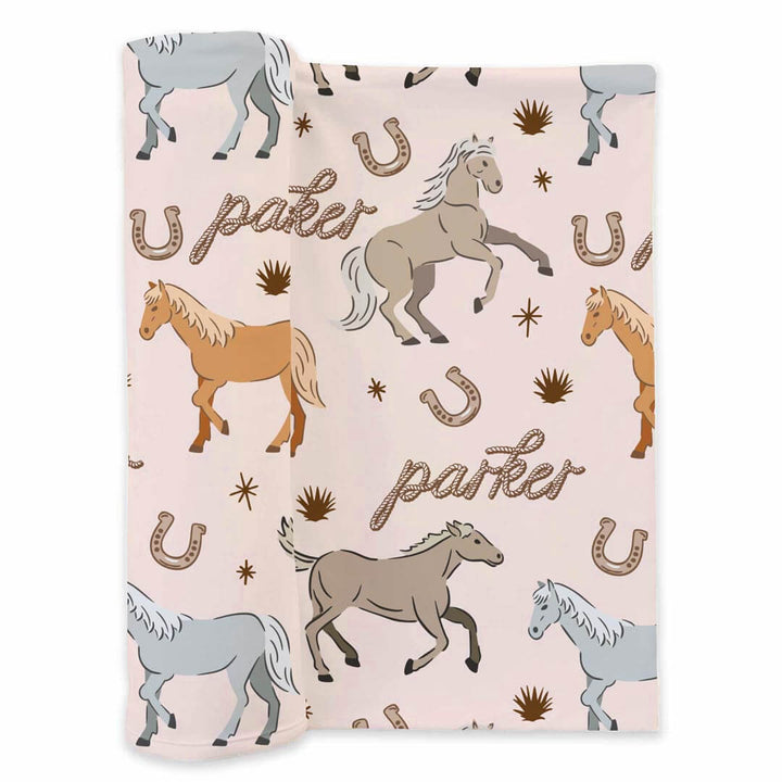 baby personalized swaddle blanket with ponies and horses print - caden lane
