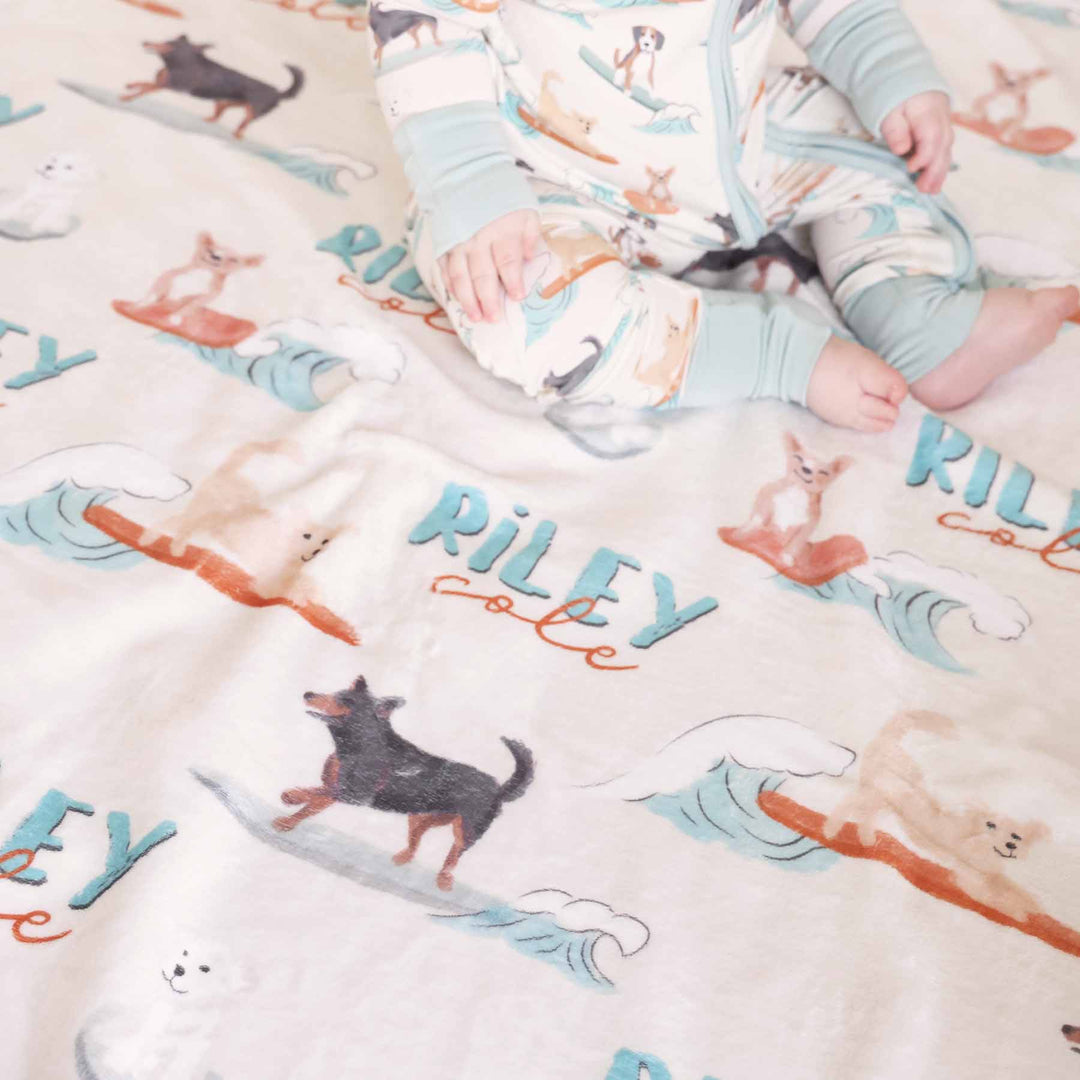 tan, turquoise and orange surfing dog blanket personalized with kids name