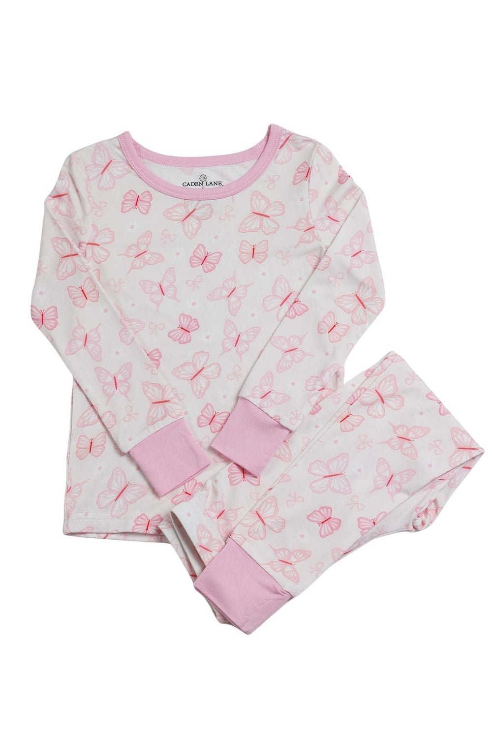 Two Piece Pajama Set in Blooming Butterflies print - flat lay showing the long-sleeve top folded with matching pants, both in white with pink butterfly print and pink cuffed edges