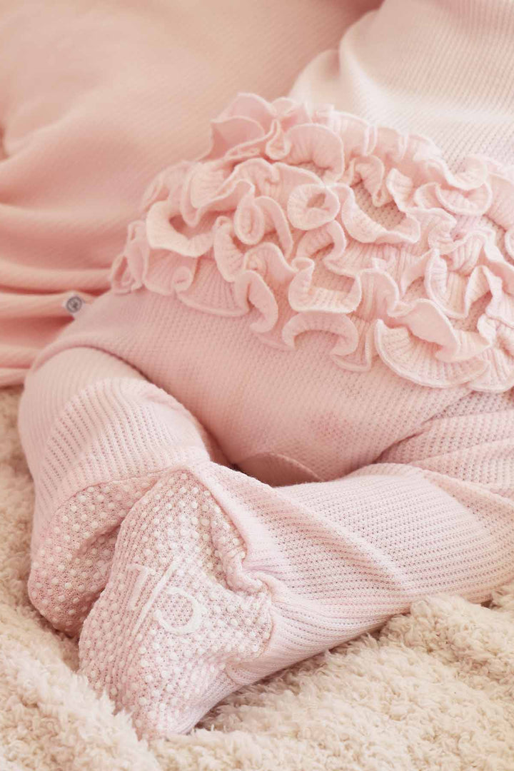 pearl pink ruffle zipper footie for babies bamboo 