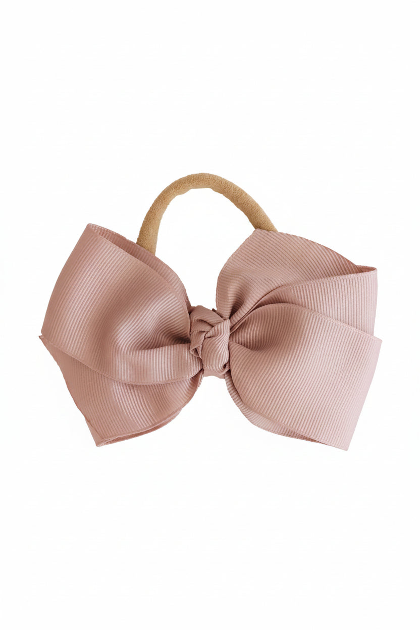 ribbon bow for babies in warm mauve pink