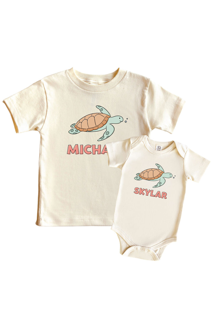 personalized turtley rad graphic bodysuit and kids tee in natural – customizable with a name
