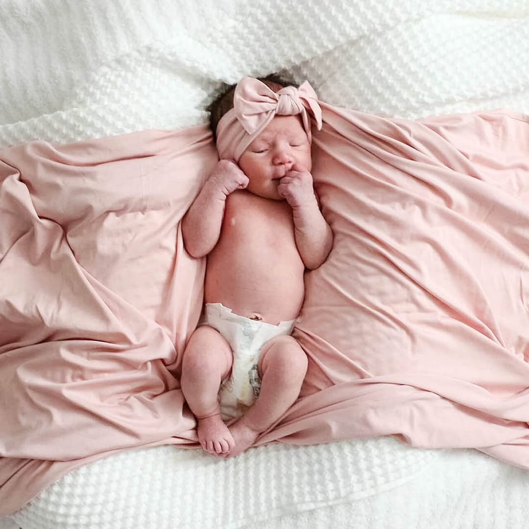 light pink oversized swaddle blanket 