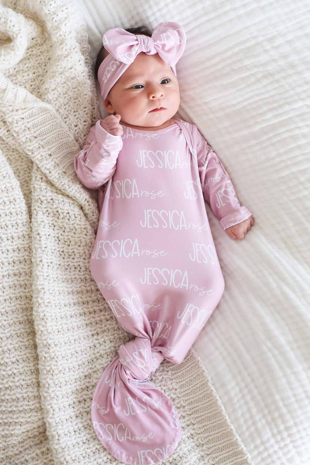pink font duo knot gown for babies 