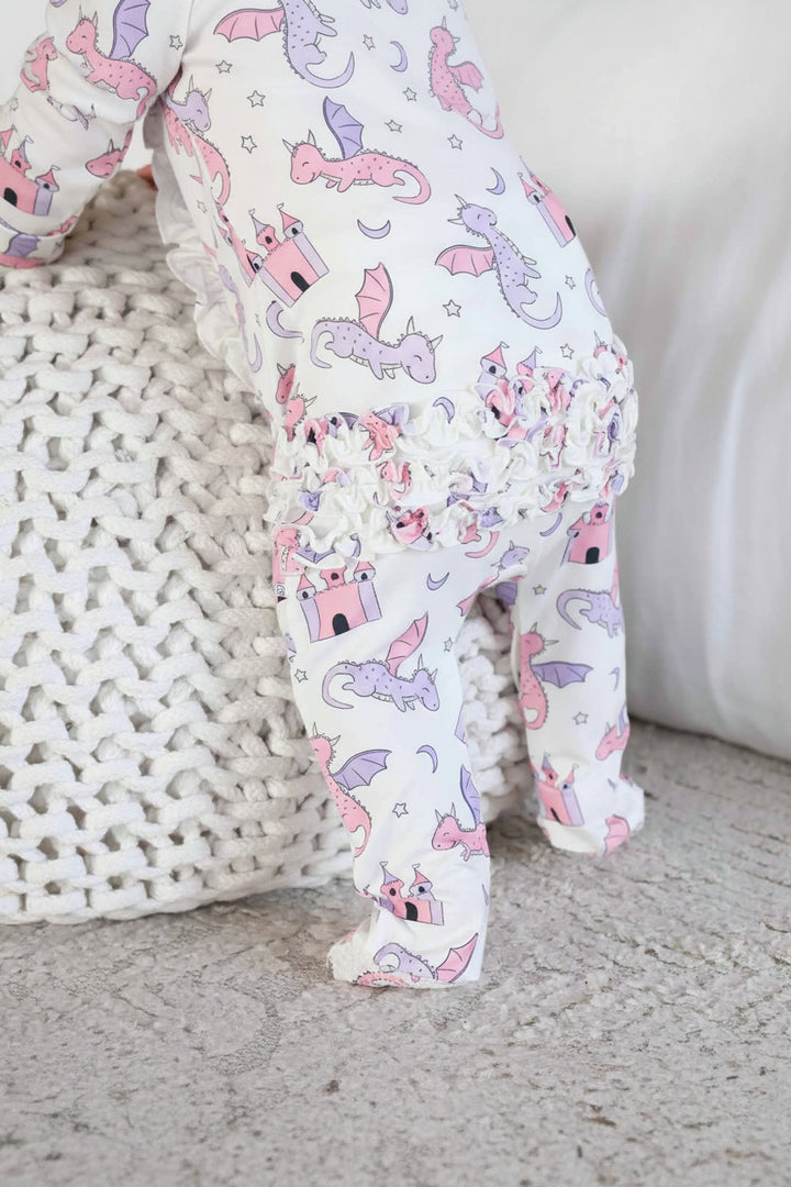 pink and purple dragon and castle ruffle bottom zipper footie for girls 