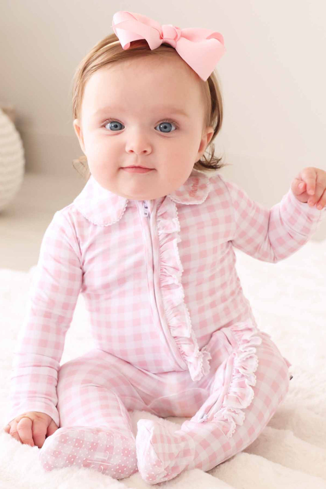 pastel pink gingham print footie pajamas with peter pan collar for little girls