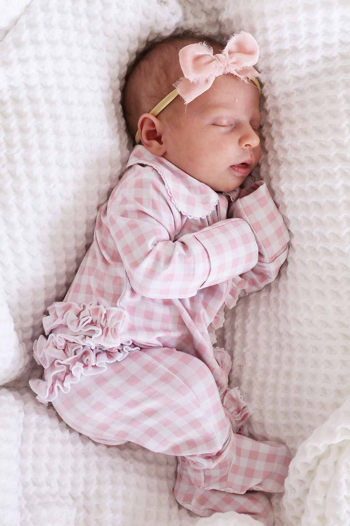pink gingham print footie pajamas with 
ruffles for baby girls