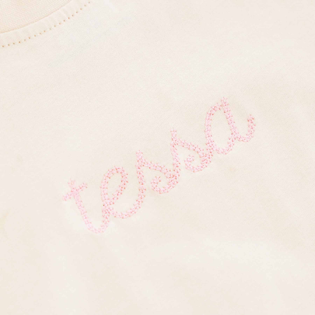 pink thread embroidered name romper long sleeve 