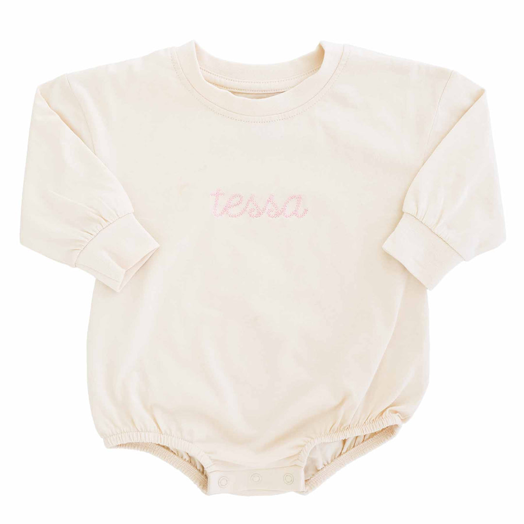 pink name embroidered bubble romper for babies 