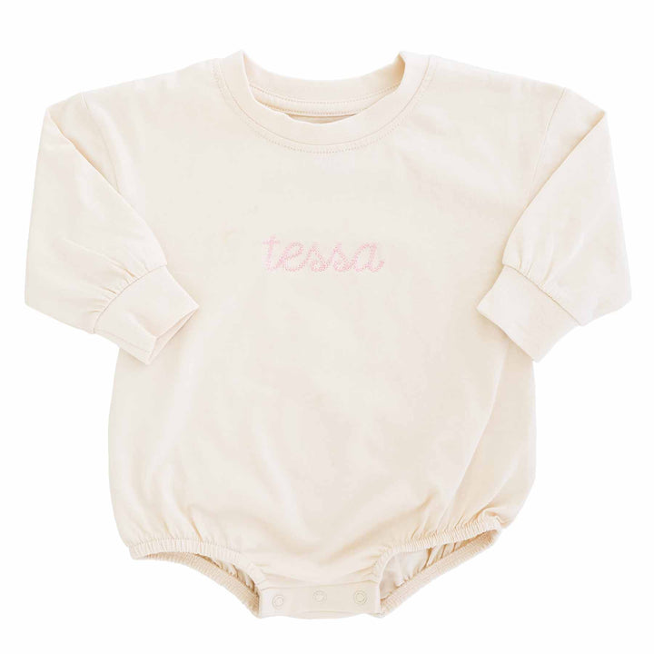 pink name embroidered bubble romper for babies 