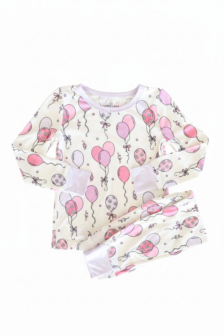 pink and purple floral accented balloons and streamer two piece long sleeve and pant pajama set for girls 
