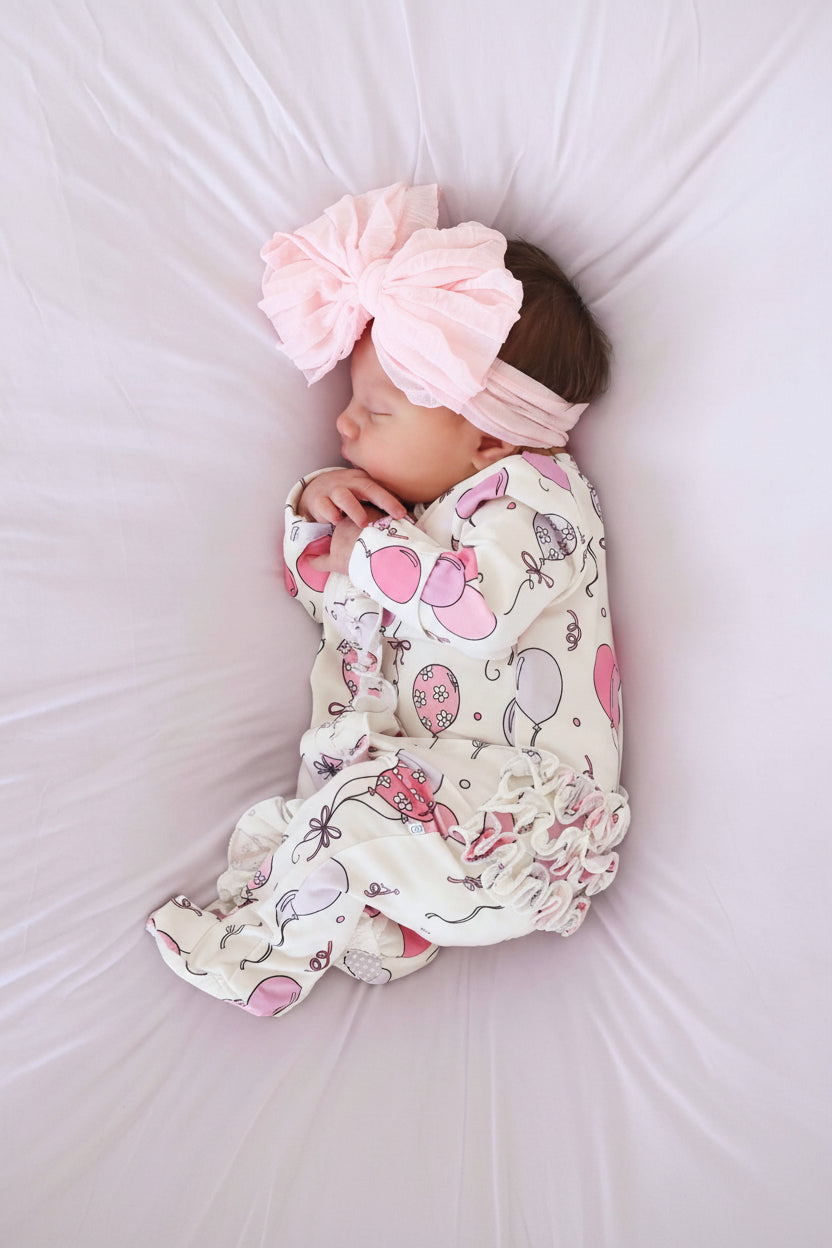 pink party time ruffle zipper footie for baby girls 