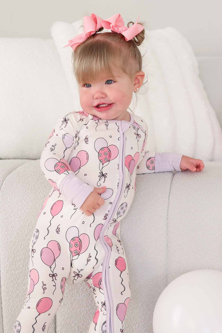 pink baby zip romper pajama with balloons 