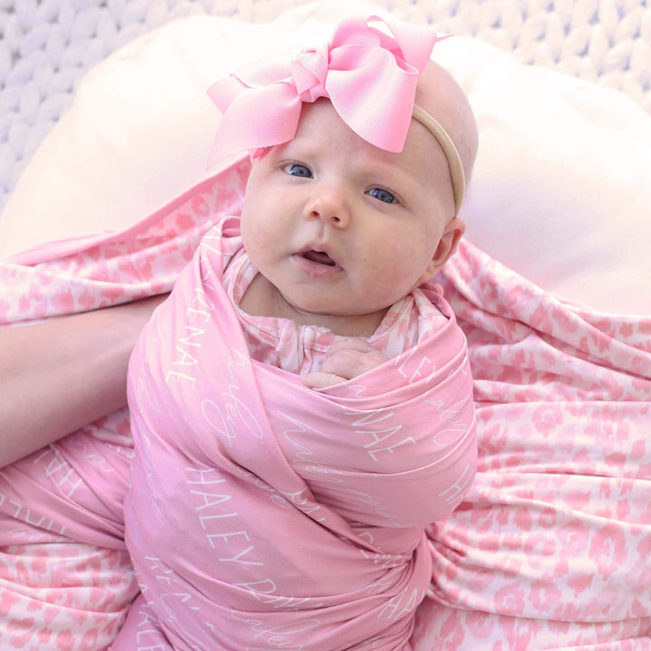 personalized tickle me pink baby name swaddle