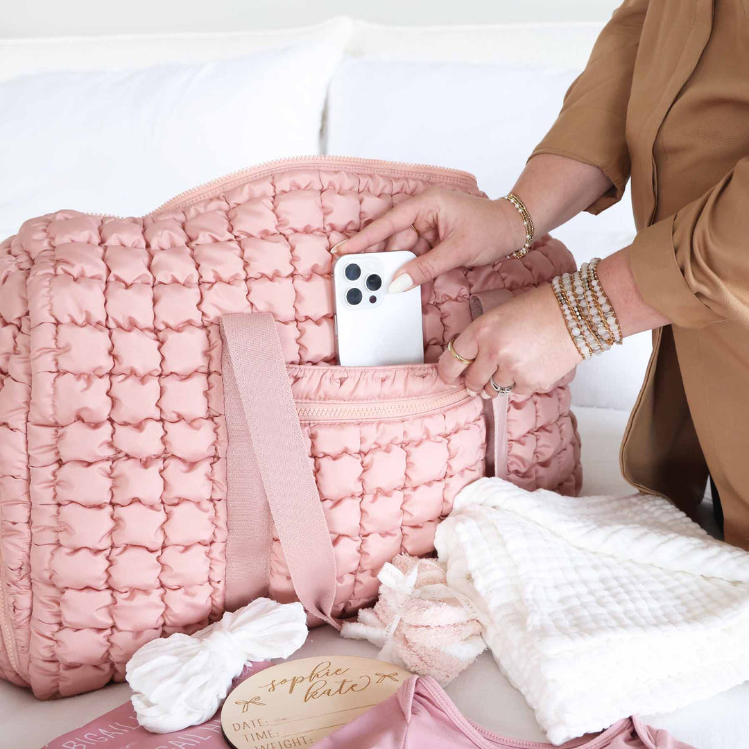 pink quilted duffel bag 