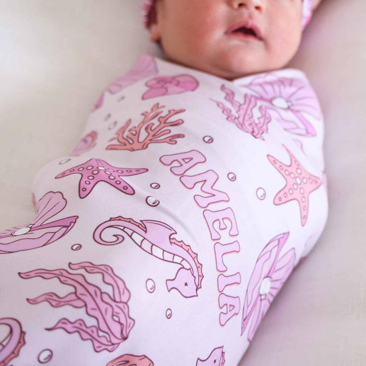tiny tides pink ocean personalized swaddle blanket for girls 