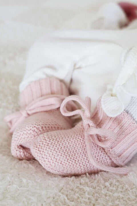 pink baby booties with bow