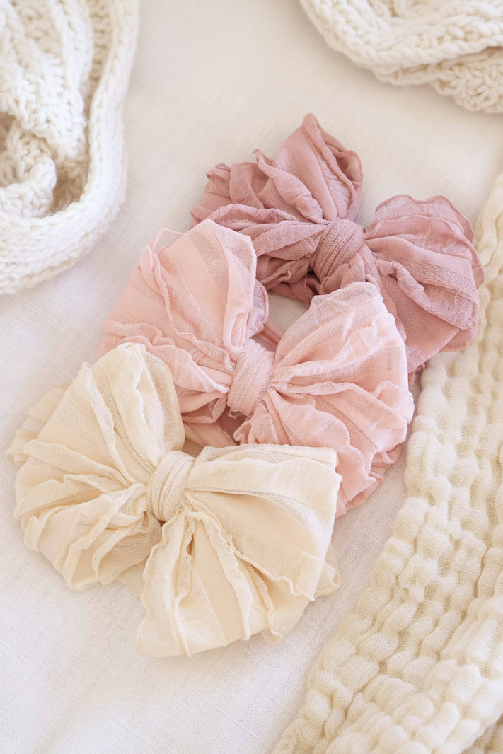 large ruffle knit bow pinks 