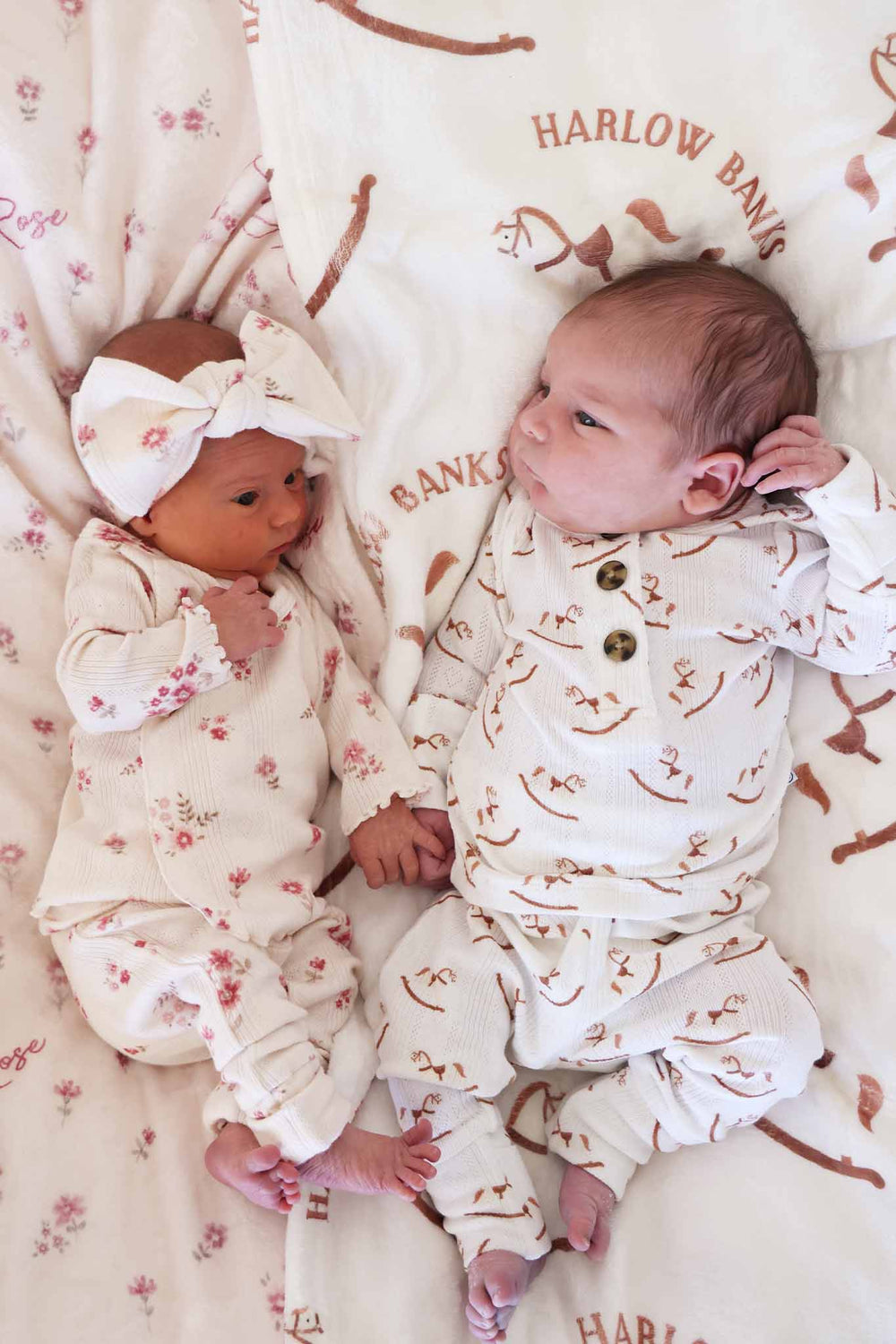 baby boy in girl in pointelle 2pc bamboo sets in mauve flower and rocking horse prints 