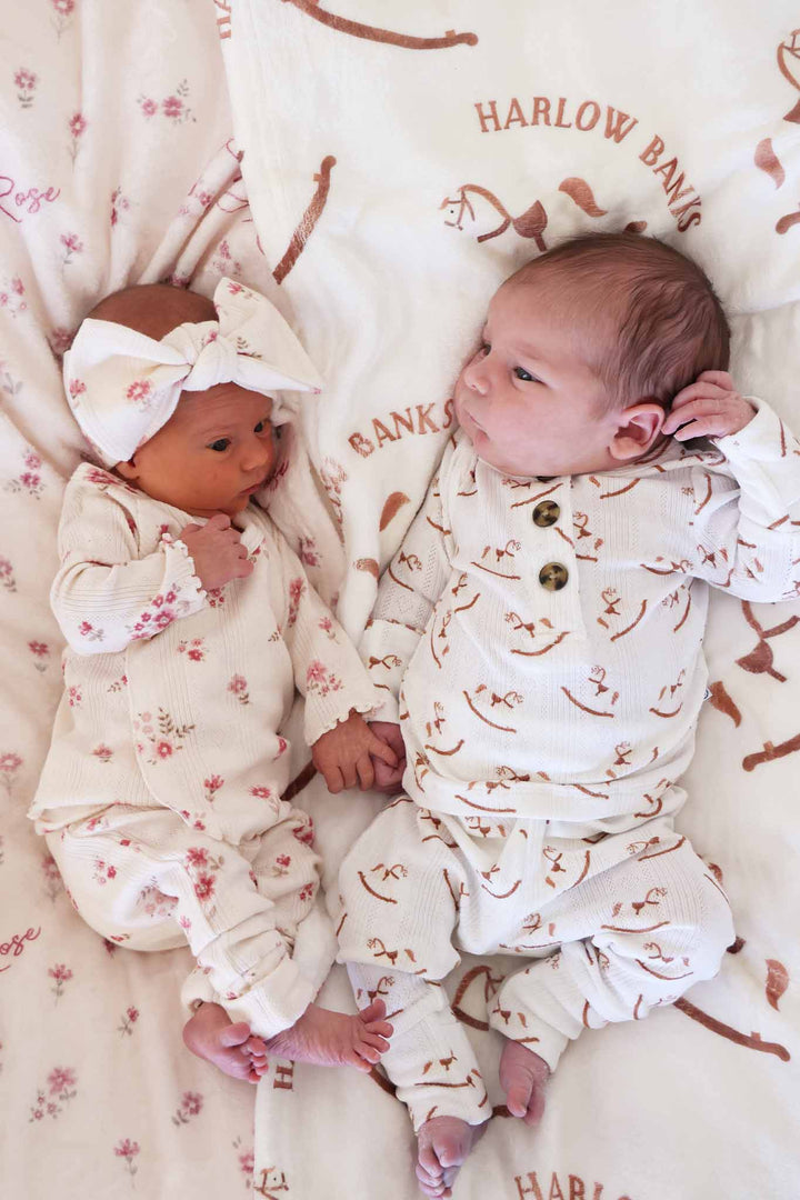 baby boy in girl in pointelle 2pc bamboo sets in mauve flower and rocking horse prints 