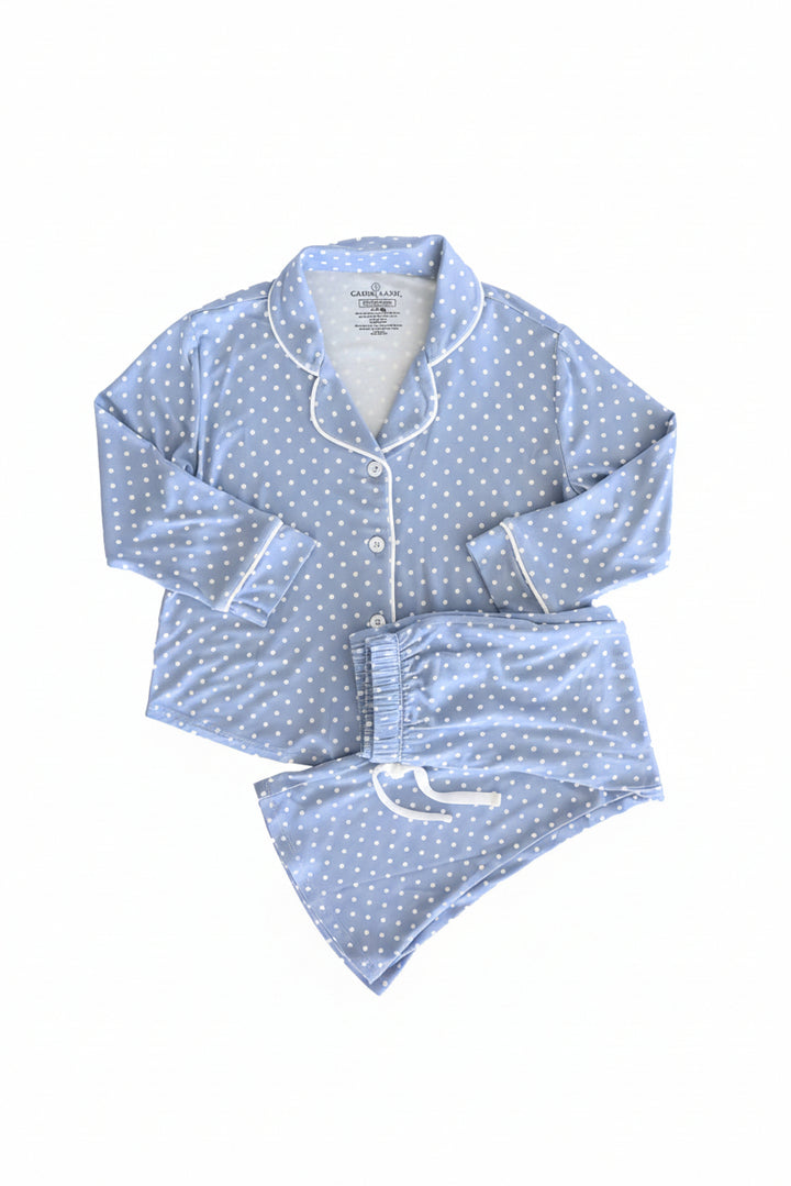 long sleeve lounge set for girls with a button up shirt with a collar and flare pants with a drawstring. dusty blue with white polka dot print.
