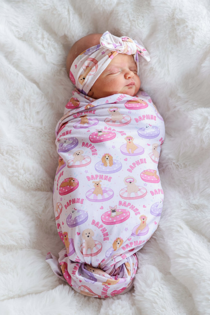 personalized pink poolside pups swaddle blanket with dog and floaties print