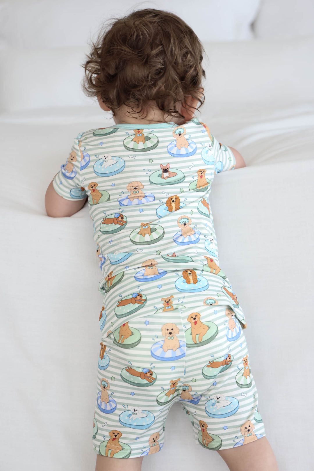 back view of short sleeve and short poolside pups pajama set