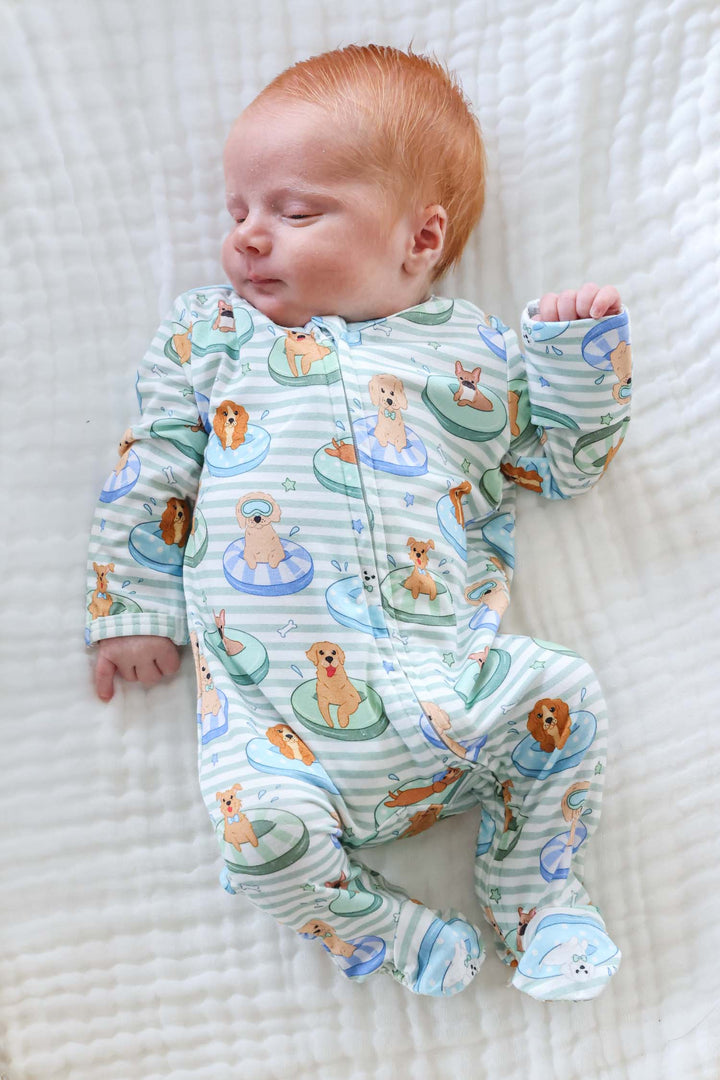 summer baby footie for boys with dogs floating on pool floats